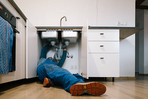 Professional Plumbing technician working in Ashton, ID